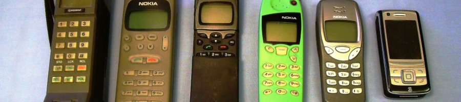 A collection of mobile phones from 1G to 3G